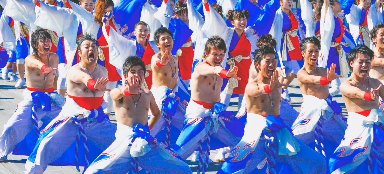 Men performing during a Japanese festival.