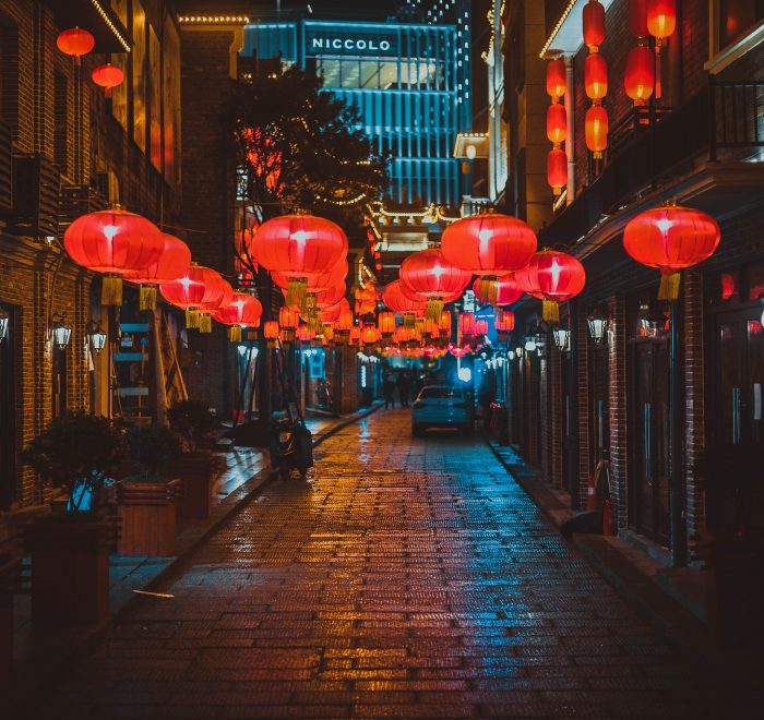 Red lanterns on an empty street in Nagasaki.