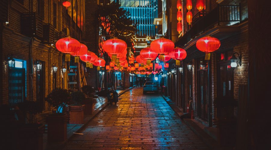 Red lanterns on an empty street in Nagasaki.